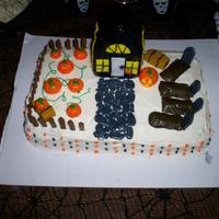 Pumpkin Patch, Haunted House Not my best work. Sheet cake with butter cream frosting. Fondant accents. House is made of rice cereal treats covered in fondant.