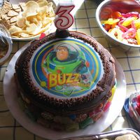 Buzz Lightyear Edible Image Cake Nephew's 3rd Birthday cake. Chocolate Mud with choc buttercream and fondant. Border got a bit squished by little fingers prior to...
