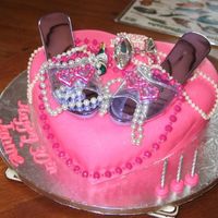 30Th Birthday Cake 30th birthday cake for my SIL. She loves shoes and pretty things so it was pretty appropriate for her. I think this was my first fondant...