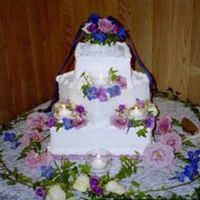 Candlelit Wedding Made this cake for a dear friend. Candle votives are on the cake in the corners.