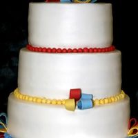 September Office Cake feeding 80 people in an office. BC icing and fondant bows and balls.