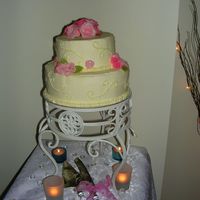 My Engagement Party Cake. This is a vanilla sponge with chocolate mud top layer, covered in buttercream. These are my first sugar roses and my first tiered cake. It...