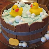 Rubber Ducky In A Tub This cake was so fun to make. It's an 8 in. vanilla cake covered and filled with chocolate buttercream icing. The slats, or boards,...