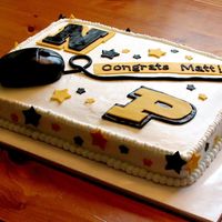 Graduation Cake A graduation cake for my friend's son. He wanted his school logo, his future college logo (Purdue) and something about computers....