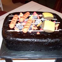 Bbq BBQ, hot dogs, hamburgers. Charcols flaming.