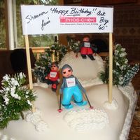 Injured Skiier My friends (all with birthdays) went on a skiing adventure and one injured his right knee so I made this cake in their honor.