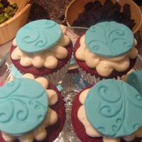 Cupcakes these were red velvet cupcakes with vanilla bc and fondabt accents
