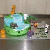 Jungle Cake 10" Round, 2 oval pans buttercream and fisher price animals for decoration