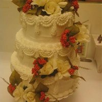 2Nd Wedding Cake This was my second wedding cake done in the bakery at work. I think if I would have had real flowers it would have looked better, but I had...
