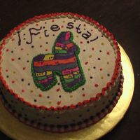 Fiesta WASC cake with buttercream icing and FBCT pinata. My daughter wanted to do the writing so I let her - she did a pretty good job, didn'...