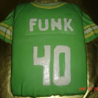 Football Jersey made for a birthday. sheet cake covered with mmf. it was my first jersey cake. I am pretty happy with it!