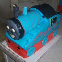 Thomas The Train Birthday Cake This was my son's 4th birthday cake. It was the second one that I had ever carved and turned out wonderfully. He loved it!