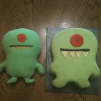 Monster Smash Cake Monster smash cake. The cake is on the right and the original monster it was made to look like is on the left.