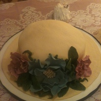 Straw Hat & Flower Cake This was made for a tea party shower cake. They wanted a garden hat for the cake.
