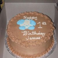 James' First Birthday I was given a pic to go by for the dog. It was from a blanket that the little boy loves. I also made a smash cake.