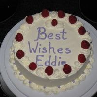 Lemon Layer Cake Lemon layer cake with IMBC and red raspberry garnish. This was for a guy at my Mom's work and I like to print the writing for guys.