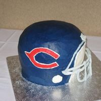 Chicago Bears 3-D Football Helmet This was a groom's cake for a friend's wedding. It was my orange cake with vanilla buttercream. The cake layers were (bottom to...