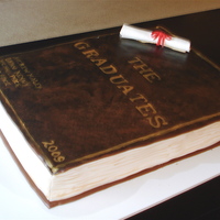 Graduation Cake This cake was for a group graduation party, 2 high school grads and 2 college grads... all different schools. I put each of their names on...