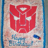 Transformer Cake This was for my sons 6th birthday. Just the way that he wanted it. Everything is edible...buttercream frosting and fondant for the Autobot...