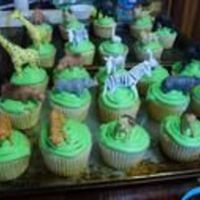 Jungle Cupcakes Cupcakes for my son's frist birthday, it was super hot outside so the buttercreamwas melting. I bough plastic animals to place on the...