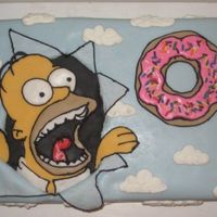 Homer's Donut In The Sky Triple chocolate cake filled with whipped ganache. Everything is fondant except the clouds (buttercream). Thanks for looking!