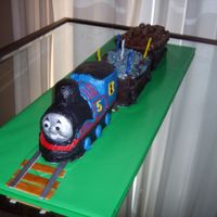 Thomas The Train Cake Made this one for my nephew's 5th birthday. It's my third cake ever and it was so much work! I used the Wilton train pan for the...