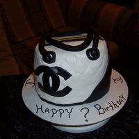 Coco Chanel Purse yellow and chocolate cake with buttercream frosting covered with white chocolate fondant with chocolate letters-My daughter's first...