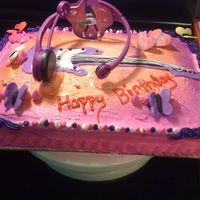 Hannah Five Flavor yellow cake with buttercream frosting guitar made out of purple chocolate fondant