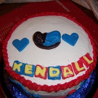 Happy Birthday yellow cake with buttercream and fondant