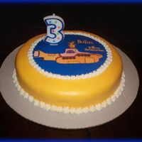 The Beatles - Yellow Submarine Birthday Cake My first try at a fondant cake and an edible image as well. My son loved it!