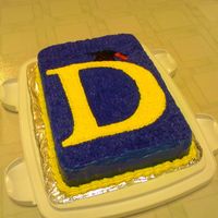 Graduation Cake For my sister, who just graduated from U of Michigan. I did a D for Deborah instead of the usual M. :)