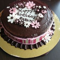 Birthday Cake Inspired (or copied?) by a cake by Pish . Chocolate cake with choc mousse filling and choc buttercream. With choc transfer and gumpaste...