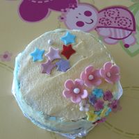 Pink Fantasy Again decorated by my daughter. Cake made using leftover batter and decoration done using leftover icing and flowers. TFL