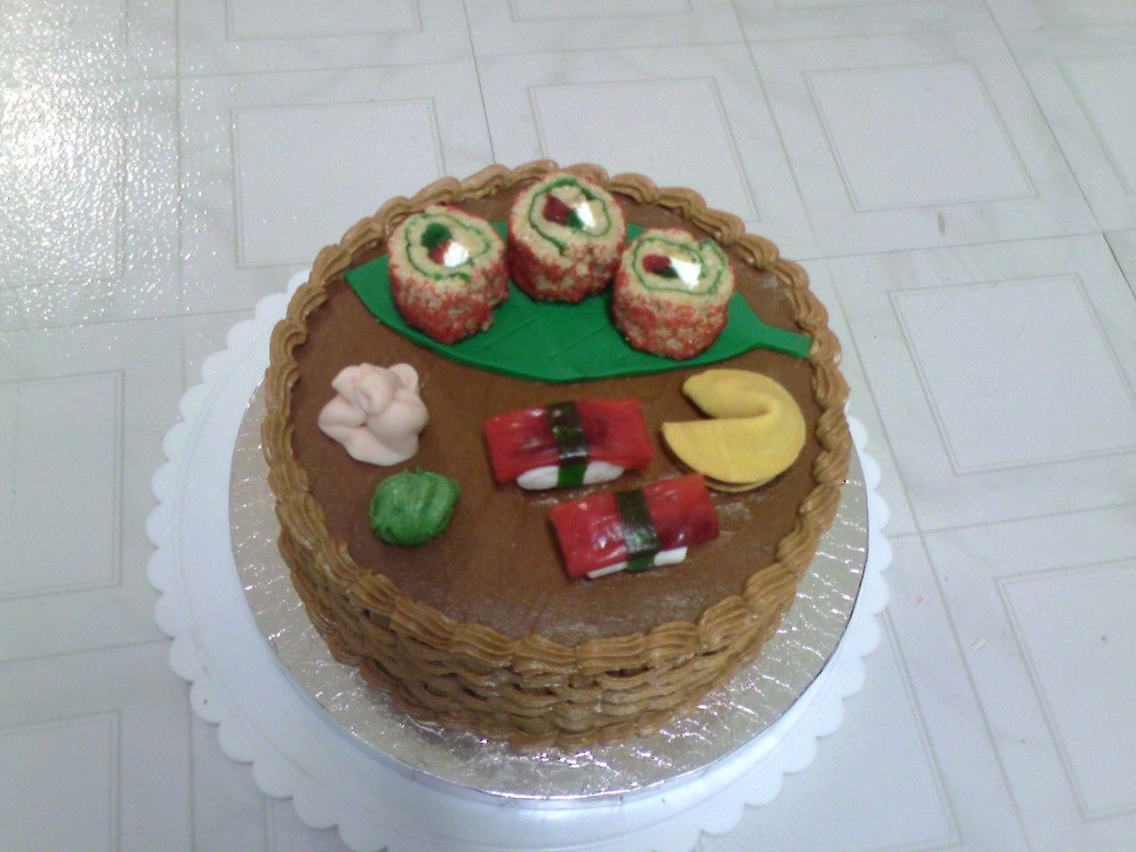 Sushi Basket Cake Thanks to the other folks who made sushi cakes, because I definitely was inspired by them! Fun stuff!