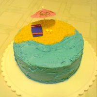 Beach Cake (too?) simple beach cake. Crushed vanilla wafers for sand, fondant sandals/beach towel. BC waves, water