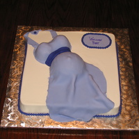 Baby Belly My first attempt making a Baby Belly cake for SIL baby shower.White Velvet cake. Square cake iced in buttercream, belly covered in Fondant...