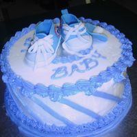 Blue Converse White cake with buttercream icing, converse sneakers out of gumpaste. Thanks fo rthe tutorials!