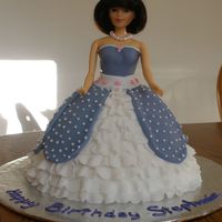 Barbie Birthday Cake This cake was my first doll. She is covered with fondant with ruffling at the base. It took a while to remember how to do the ruffling but...