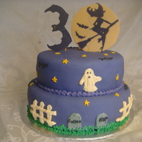 Halloween And 30Th Birthday Cake I made the cake toppers out of melted candy wafers. Cake is wrapped in fondant and decorated with buttercream.