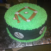 Baseball Yellow cake with BC icing and fondant accents...a one day notice cake...TFL