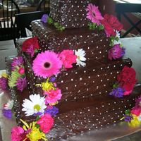 Chocolate Wedding Cake 4-tier ganache wedding cake with flowers