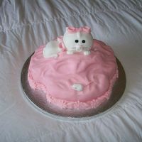 Meow! Maderia cake covered with sugarpaste.Cat an Mouse made out of sugarpaste