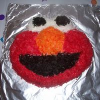 Elmo Cake Tinted coconut covered Elmo