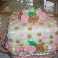 Fondant With Fondant Decorations Yellow cake with fondant icing. Fondant roses and decorations