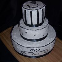 Bobby & Sam's Wedding Shower Frost n' Pride (not so easy to smooth) Black is BC. Two of the tiers are yellow cake with strawberry filling and one is chocolate with...