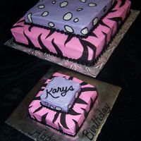 1St Birthday! This two tier wild cake is BC with fondant accents. And the mini me just for the birthday girl.