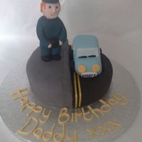 Traffic Warden Cake my friend requested this cake for her boyfriend, he is a traffic warden so thats what she wanted on his cake! chocolate cake with chocolate...