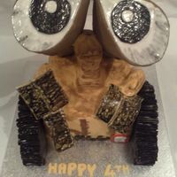 Wall-E Cake! i made wall-e! asked my friends little boy what he wanted for his birthday cake this year and thats what he said! lets say it was an...