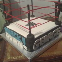 Wrestling Cake this cake was made for my cousin who is a mad wrestling fan! cake is a chocolate cake with chocolate buttercream. cake is covered in...