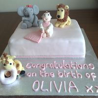 Welcome Olivia here is the finished cake to welcome my boyfriends sisters baby girl olivia to the family! all characters are fondant. cake is a chocolate...